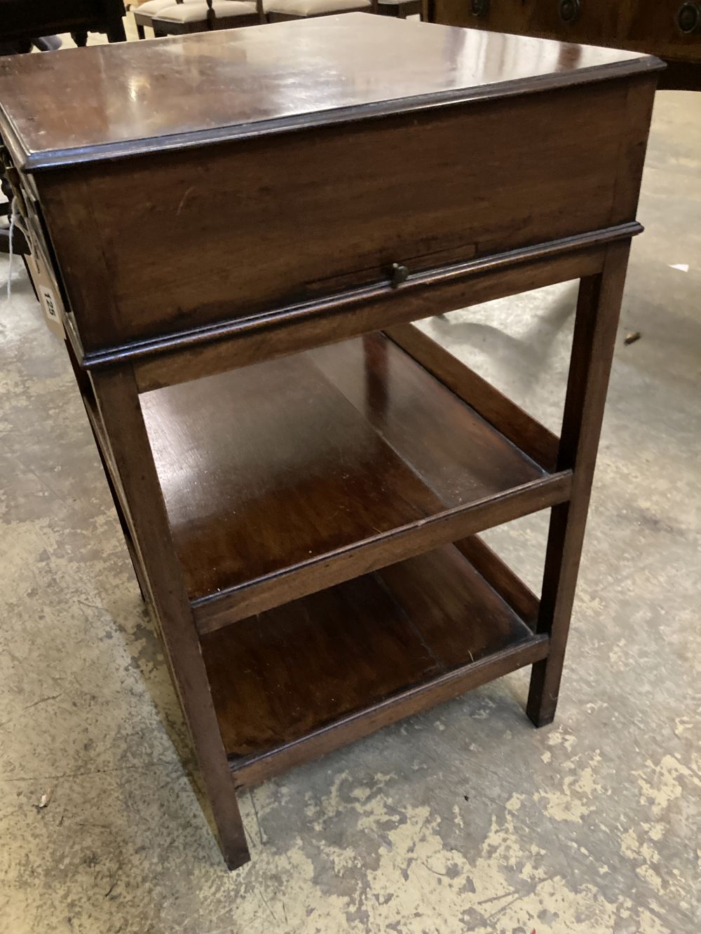 A George III style mahogany three tier table, fitted single drawer, width 47cm depth 41cm height 71cm